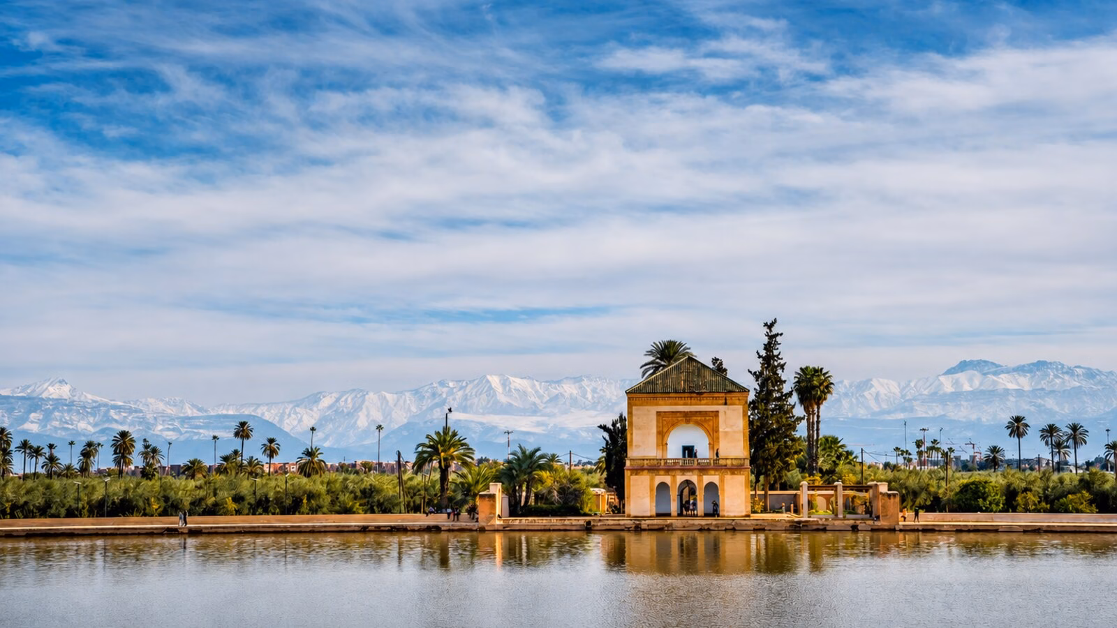 Menara Gardens pavilion with the Atlas Mountains behind Marrakech